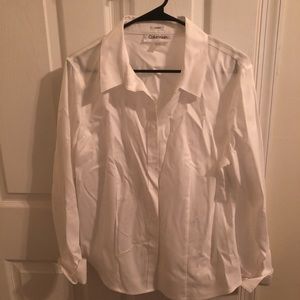 Button down blouse with collar.